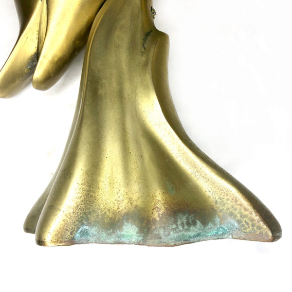 large brass dolphin statue