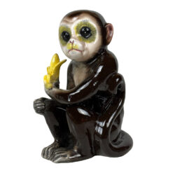 Mid-Century Japanese Porcelain Monkey Holding Banana Sculpture